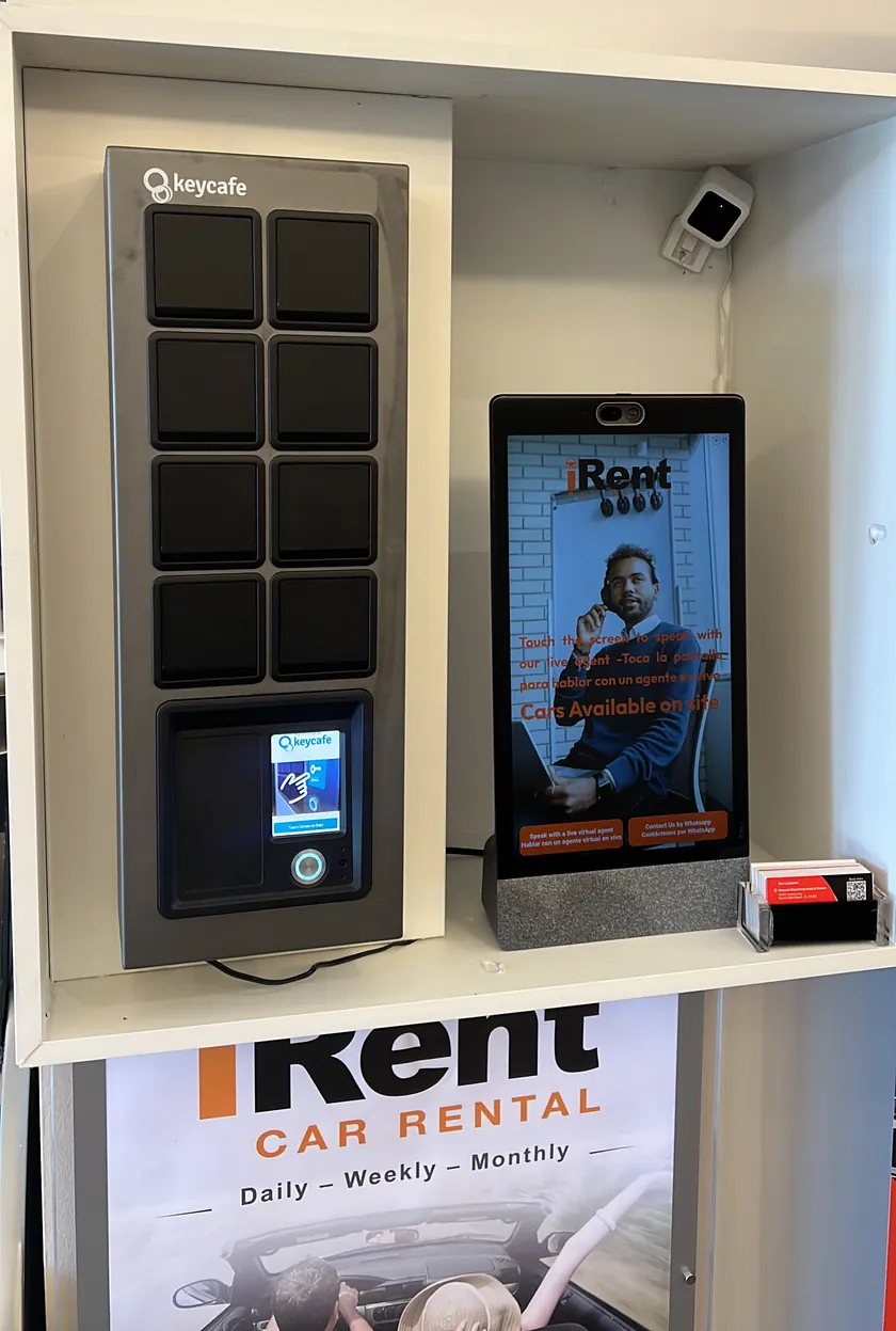 iRent self-service key box (Keycafe locker) and touchscreen virtual-agent kiosk at the Sunny Isles Beach branch in the Newport Beachside Hotel & Resort